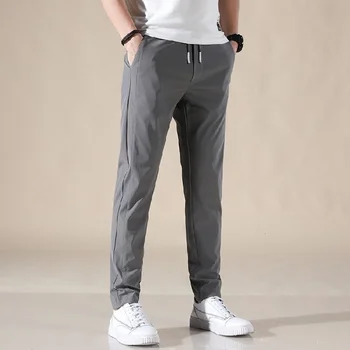 Повседневные брюки Chino, мужские Корейские тонкие классические Летние брюки с эластичной резинкой на талии, модные Легкие брюки цвета Хаки, черные стрейчевые Мужские